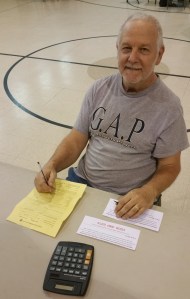 Pictured is volunteer John Leibenguth of Tamaqua helping to register individuals and families for assistance.