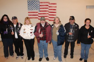 Pictured during the Lehighton vigil are event volunteers, from left, Ann Marie Calabrese of "The Link", who lost her sister Mary Ann Calabrese on September 1, 1997; Mike and Sally Wargo, who both lost their son Army SPC Michael Wargo (a war veteran) on May 20, 2013; Ronald and Gail Strohl, who lost their son Kyle Strohl on August 27, 2007; Bill Lower; and Lourdes Russaw (P.O.W.E.R. organizer). Gail Strohl, facilitary of HALOS of Carbon County, was the coordinator for the Lehighton vigil.