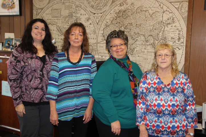 From left are staff Ann Marie Calabrese of 3 years, Wanda Kropp of 2 years, Susan Anderson of 1 year, and Ann Kline of 16 years.