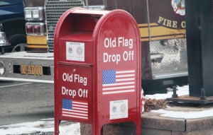 old-worn-ripped-flag-drop-off-in-front-of-mcadoo-fire-company-mcadoo-2-5-2017